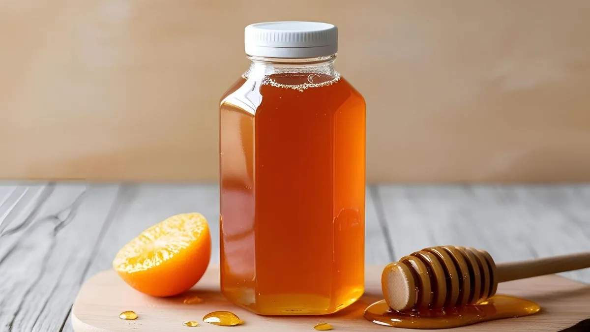 ilustrasi gambar madu multiflora asli warna kuning orange